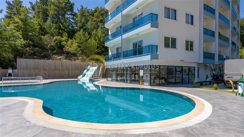 Avsallar Aoua Rezidans’ta Eşyalı 1+1 Satılık Daire – Güney Cephe