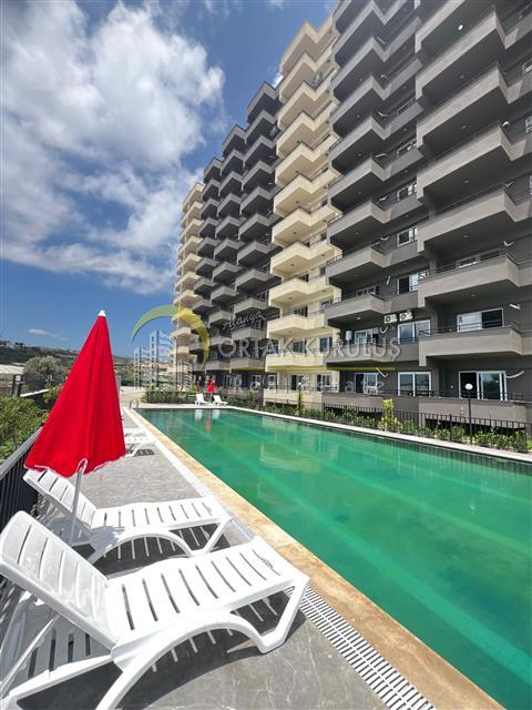 Mersin Erdemli Sun Maria Beach | 375 m vom Meer entfernt | 1+1-Wohnung zum Verkauf