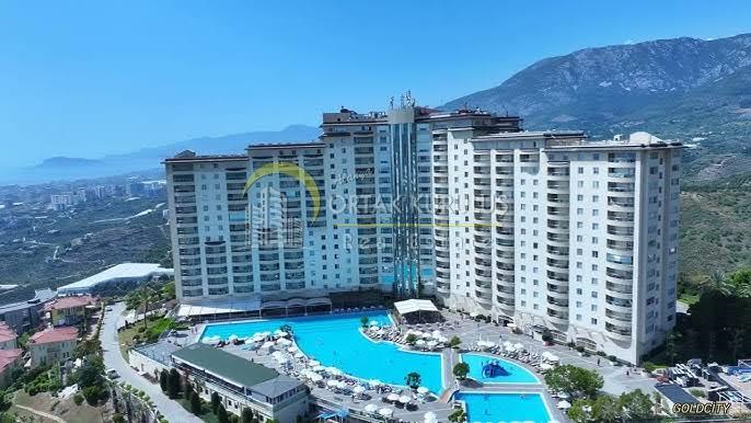 Till salu: 2+1 lägenhet med havsutsikt i huvudbyggnaden av Gold City, Alanya Kargıcak