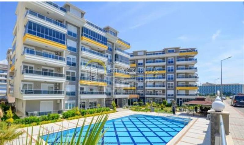 Alanya Kestel'de 2+1 Eşyalı Daire – Denize 50m, Havuzlu Site