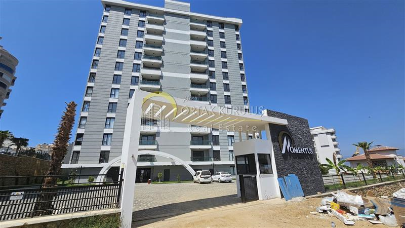 In Mahmutlar, Möblierte 2+1 Wohnung mit Meerblick zu verkaufen.