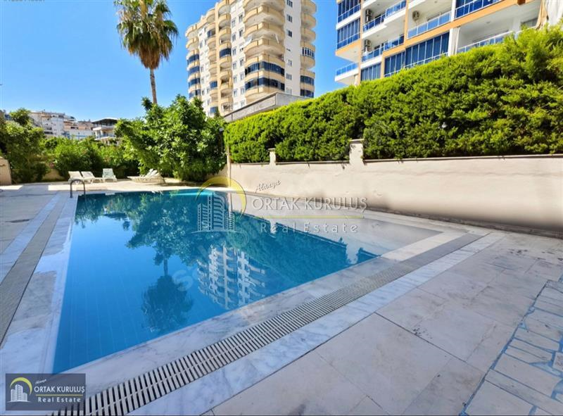 Mahmutlar’da Eşyalı 3+1 Geniş Daire – Şekerci Apt. Satılık