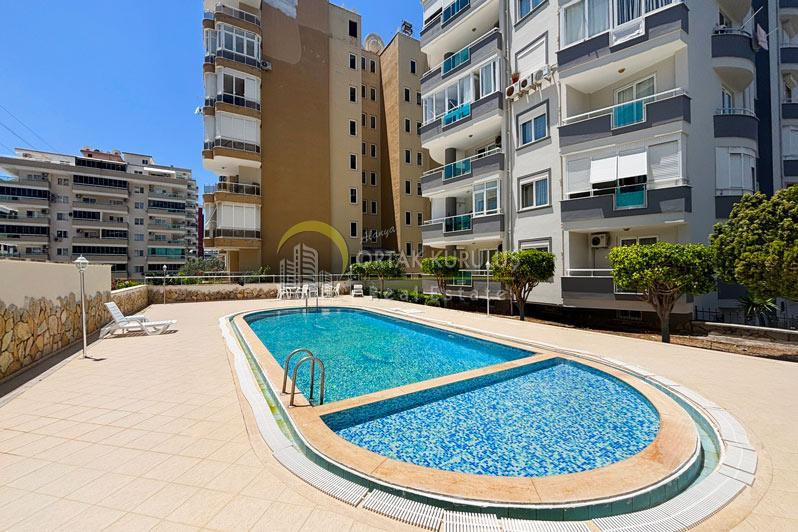 Mahmutlar Topçu 2’de 2+1 Eşyalı Daire – 105m², Denize 600m