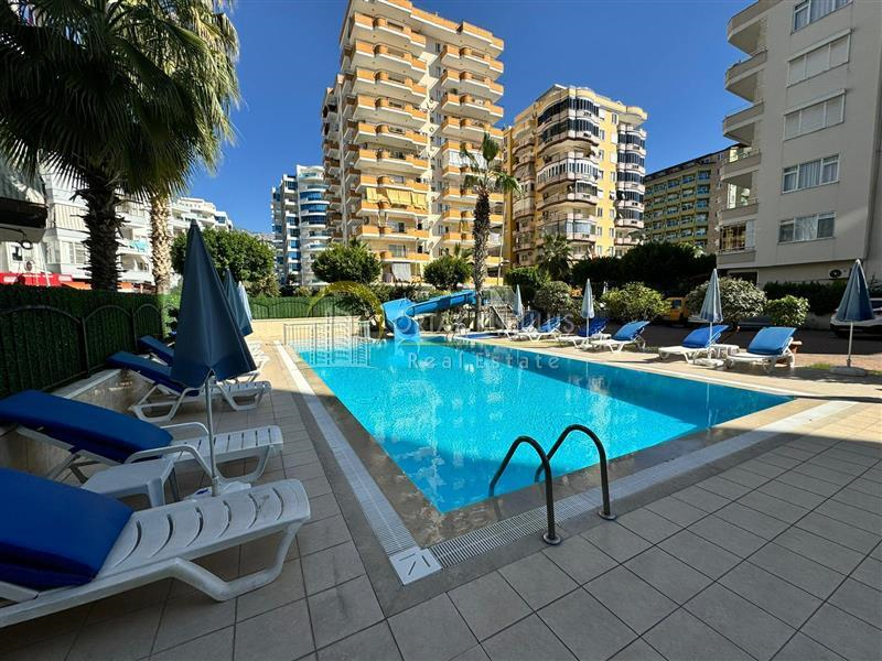 Furnished 2+1 apartment for sale on Barbaros Street in Mahmutlar.