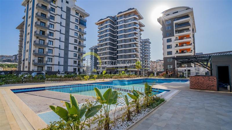 Alanya Mahmutlar'da Satılık 2+1 Full Eşyalı Daire | Havuzlu Sitede