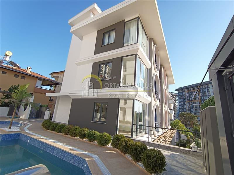 Mahmutlar Zera Apt. Satılık Eşyalı 1+1 Daire | Giriş Kat, Havuzlu