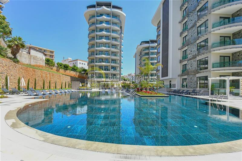 Luxuriöse 1+1 Wohnung in Tosmur – 150m zum Meer, Residenz mit vollständiger Ausstattung
