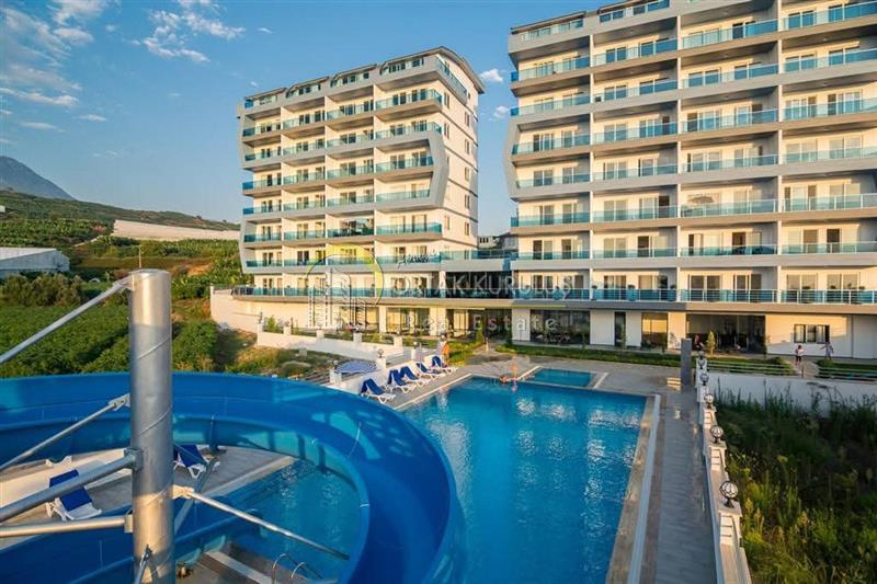 Avsallar Exodus Garden Satılık 1+1 | İskanlı 4. Kat Doğu Cephe Açık/Kapalı Havuzlu