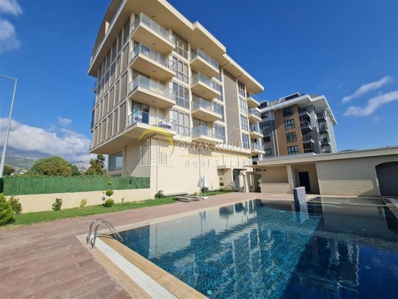 Kargıcak Soho Residence Satılık 1+1 | Denize 300m 4. Kat Cam Balkonlu
