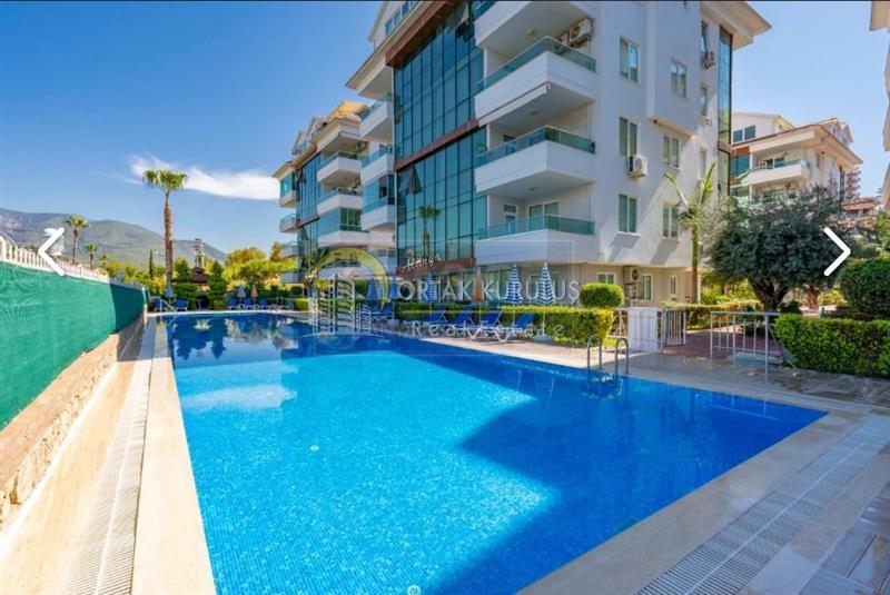In English: '1+1 fully luxurious apartment close to the sea, 400 meters away in Alanya Kestel - Code 3576.'