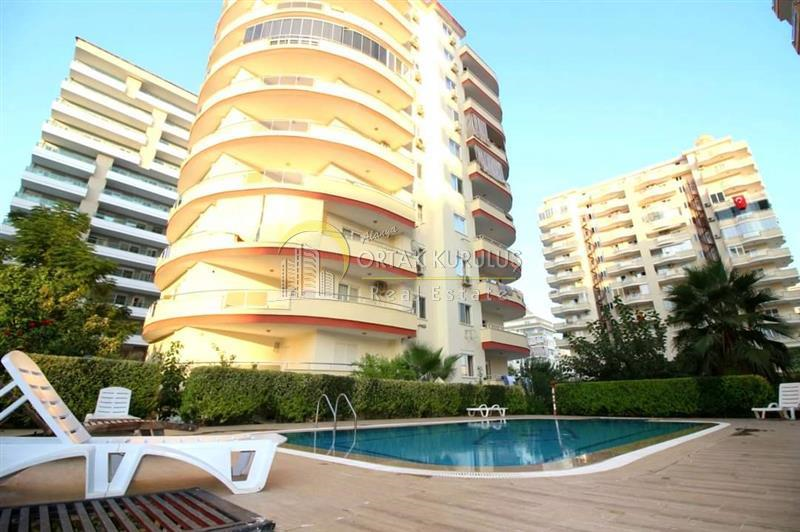 Fully furnished 2+1 apartment in Kayhan Apartment on Atatürk Street in Alanya Mahmutlar | Close to the sea, with outdoor pool!