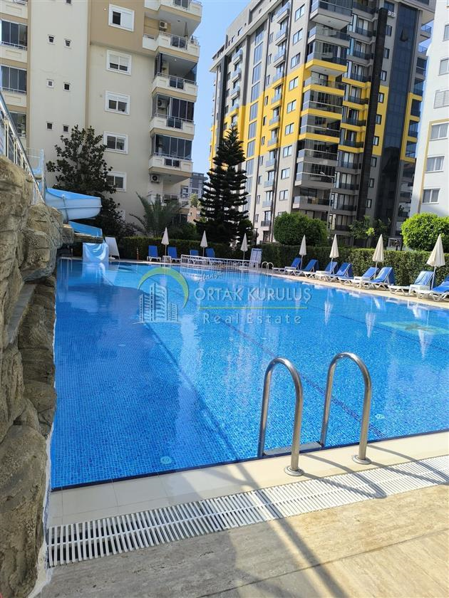 Alanya Mahmutlar zu verkaufen, voll möblierte 2+1 Wohnung, Wohnanlage mit Pool, 115m²