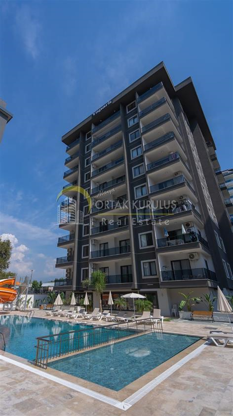 Luxuriöse 1+1 Wohnung in Mahmutlar Yenisey Yaparlı – Poolseite zu verkaufen