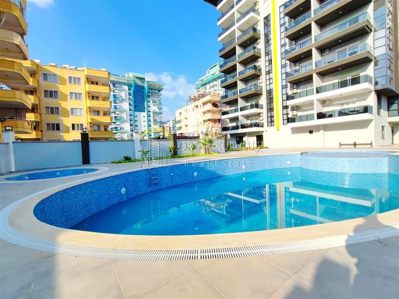Family Garden Residence, located in Alanya Mahmutlar, is a 4+1 apartment with a size of 300 m². It is 400 meters away from the sea and combines luxury and comfort.