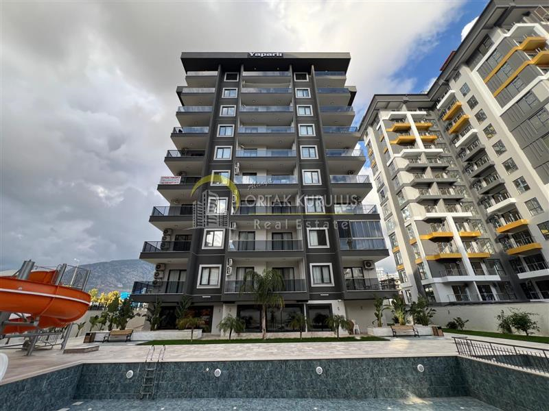 1+1 Apartment for Sale in Mahmutlar – Yenisey Avangarde, Close to the Sea