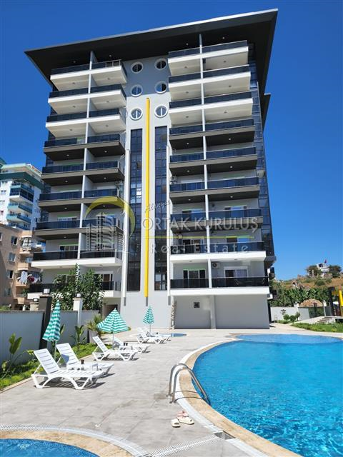 Furnished 1+1 Apartment for Sale in Alanya Mahmutlar – Family Garden