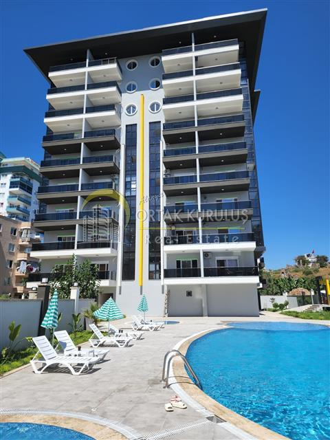 This apartment, located in Mahmutlar, is brand new, luxurious, and offers citizenship opportunity with zero distance to the sea.