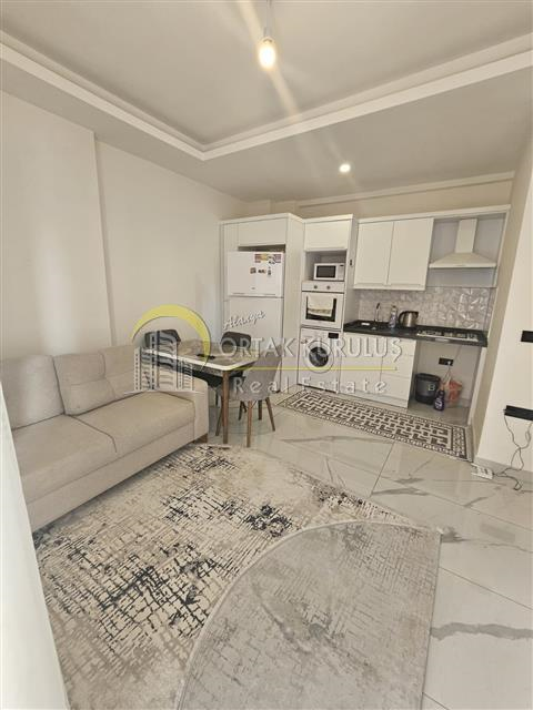 For sale, furnished 1+1 new apartment in the center of Alanya Mahmutlar.