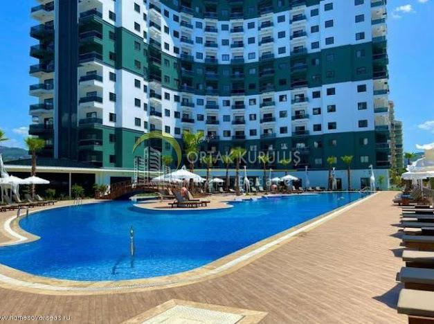 1+1 apartment with pool view in Alanya Mahmutlar Serenity Residence.