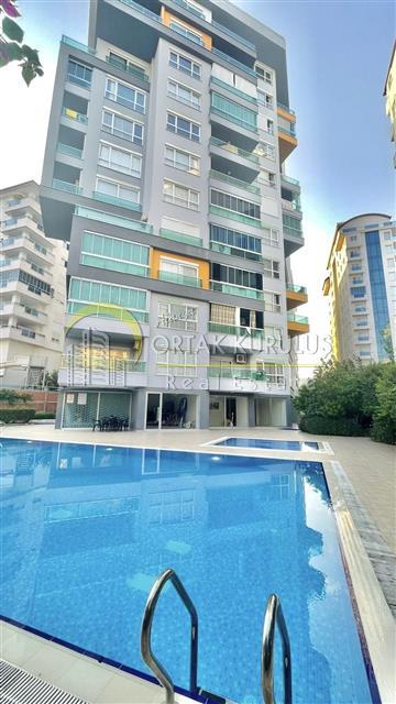 1+1 apartment for sale in Mahmutlar Gold Aura 2 – 65 m², near the sea