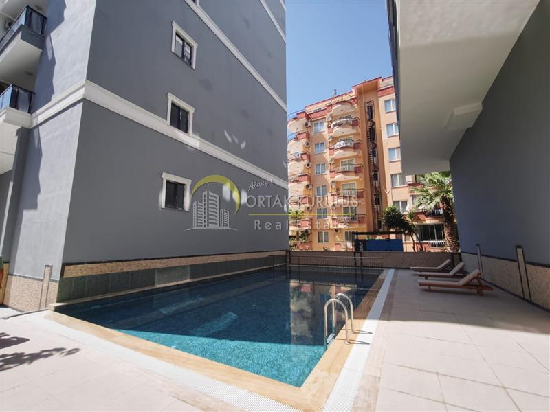 Mahmutlar Barbaros Cad Satılık 1+1 | Saat Kulesi Yanı Denize 150m Krediye Uygun