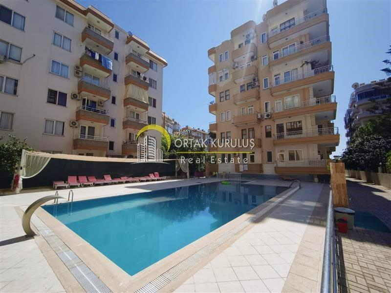 Mahmutlar Gul Kent Site for Sale 2+1 | Direct Seafront Separate Kitchen with Side Sea View